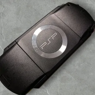 Sony PSP Fat Nera con custodia e giochi