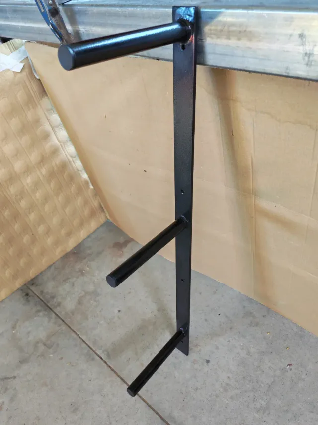 Soporte de pared para discos de pesas