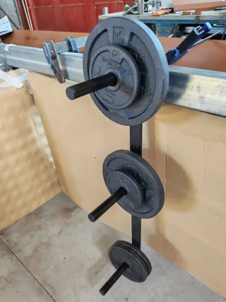 Soporte de pared para discos de pesas