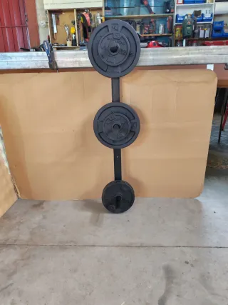 Soporte de pared para discos de pesas