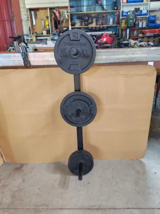 Soporte de pared para discos de pesas