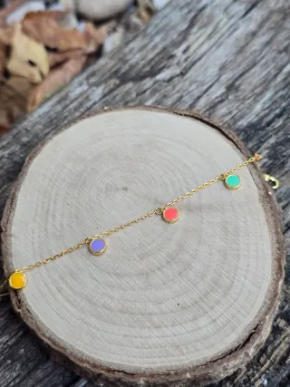 Pulsera dorada con círculos de esmalte