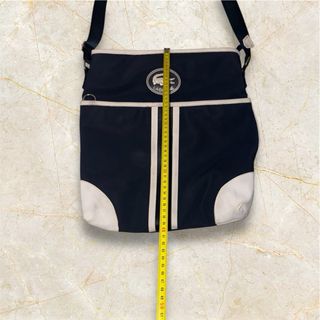 Bolso bandolera Lacoste azul y blanco