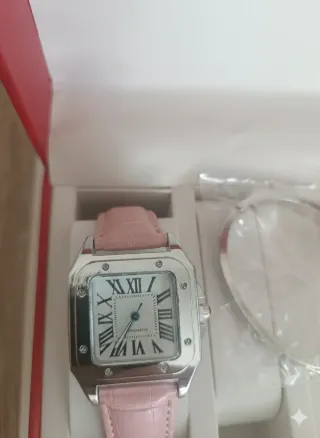 Reloj rosa con pulsera de cuero
