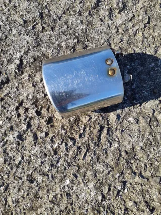 Cola de escape cromada