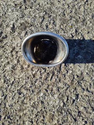 Cola de escape cromada