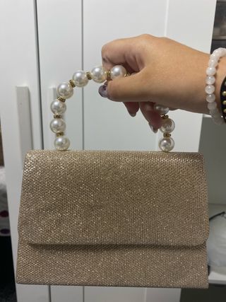Bolso de fiesta dorado con perlas