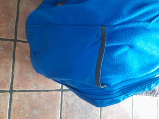 Chaqueta The North Face azul y gris
