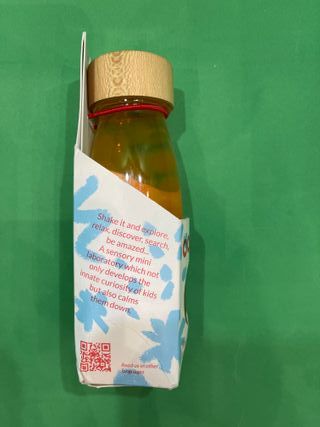 Bottiglia sensoriale Petit Boum arancione