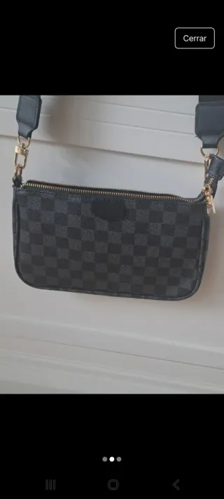 Bolso negro con tira ancha