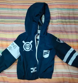 Giubbotto bambino blu con cappuccio