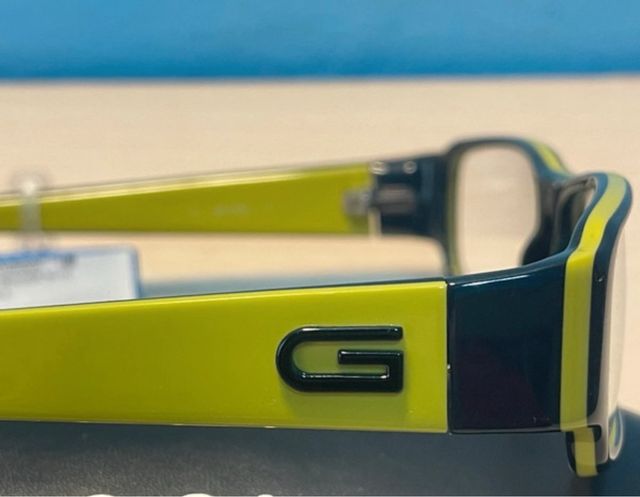 Montura de gafas Gucci negra y amarilla