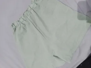 Shorts verdes mujer con bolsillos 