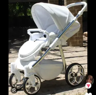 Cochecito de bebé con sillita y saco
