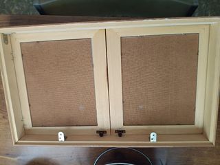 Marco de madera con cuadros de flores