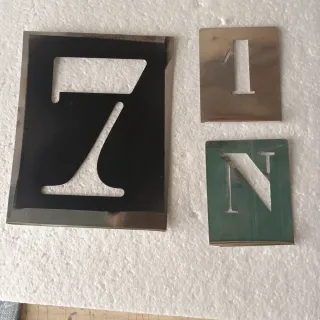 Juego de letras y números metálicos,un juego