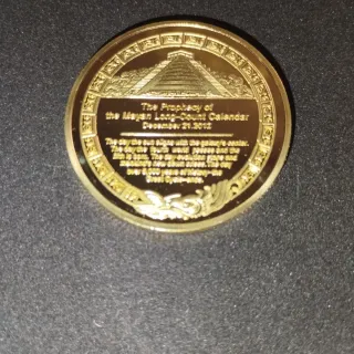 Monedas de colección egipcias y aztecas