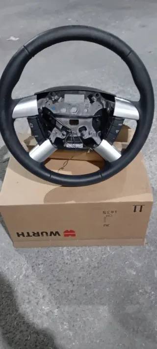 Volante con mandos y airbag