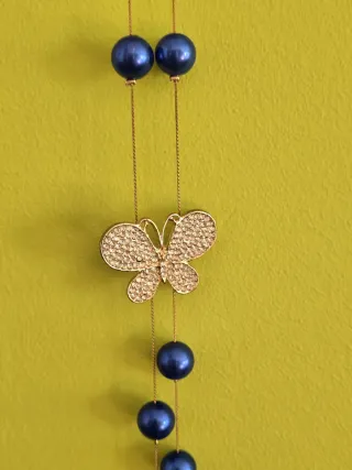 Collar mariposa y perlas azul 