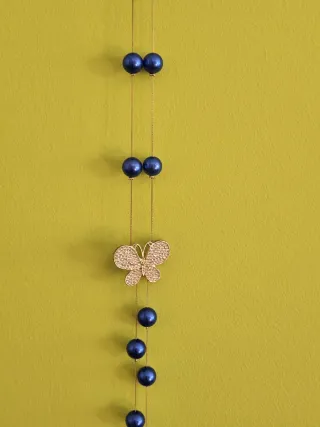 Collar mariposa y perlas azul 