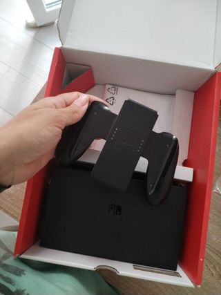Nintendo Switch OLED azul/rojo + juegos.
