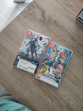 Nintendo Switch OLED azul/rojo + juegos.
