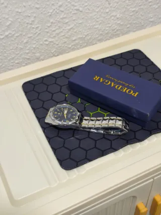Reloj poedagar Hombre Oro Plata