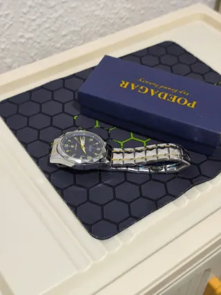 Reloj poedagar Hombre Oro Plata