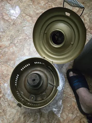 Estufa petróleo antigua bronce funciona