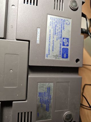 Consola NES más 7 juegos, 2 mandos y pistola.