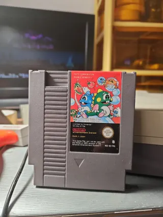 Consola NES más 7 juegos, 2 mandos y pistola.