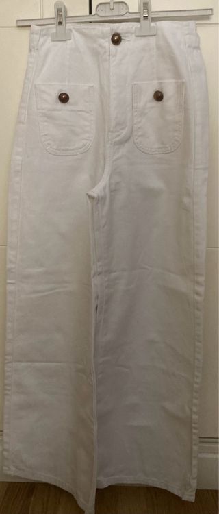 Pantalones anchos  bolsillos delanteros 