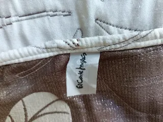 Colcha ligera beige y marrón El Corte inglés