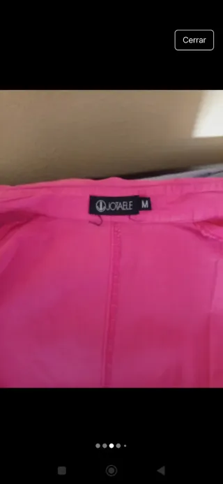 Camisa verano sin mangas en rosa fucsia.