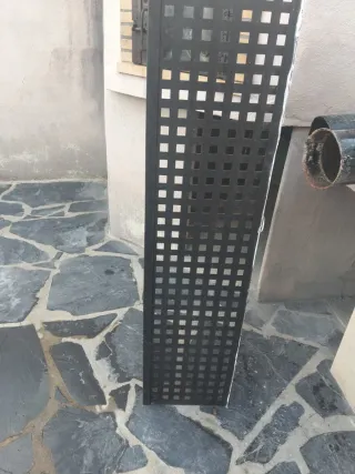 Estufa de leña rinconera metálica