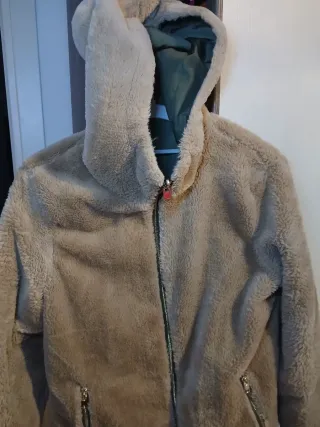 Pellicciotto con cappuccio reversibile