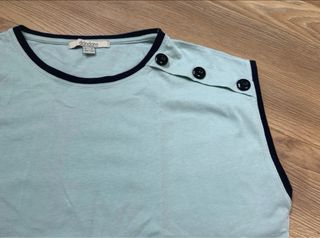 Camiseta sin mangas Dandara verde y blanca