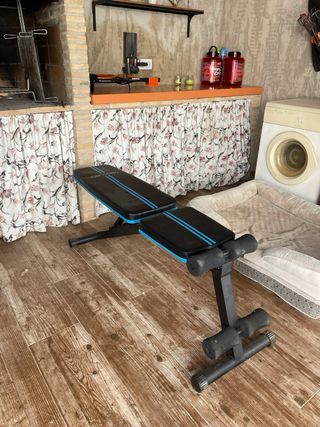 Panca e pesi da palestra