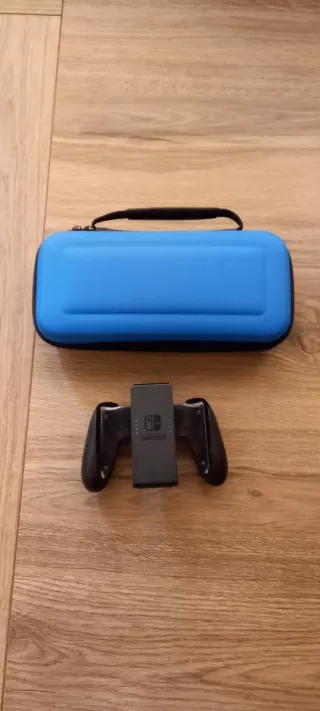 Nintendo Switch OLED + 6 giochi + accessori.