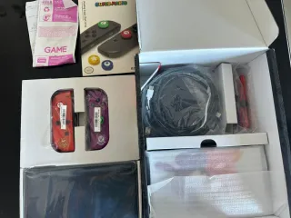 Nintendo Switch OLED Morado/Rojo