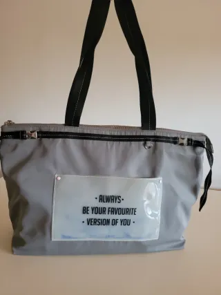 Borsa shopping grigia con frase