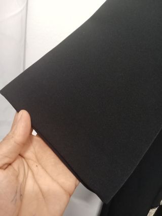 Traje negro y dorado