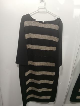 Traje negro y dorado