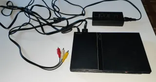 PS2 Slim Negra + 10 Juegos + Micrófonos + m. card