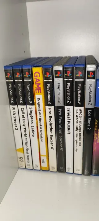 PS2 Slim Negra + 10 Juegos + Micrófonos + m. card