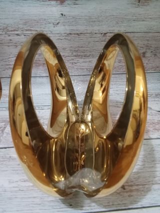 Bolso de mano dorado acrílico
