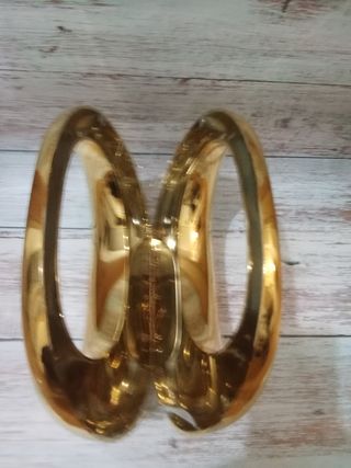 Bolso de mano dorado acrílico