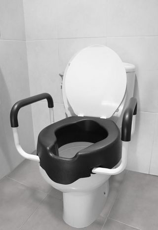 Elevador WC KMINA con Reposabrazos y Tapa