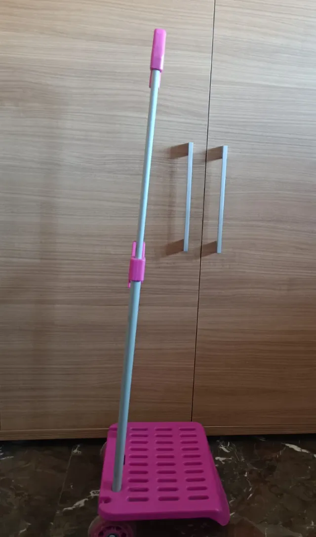 Carrito rosa para mochila