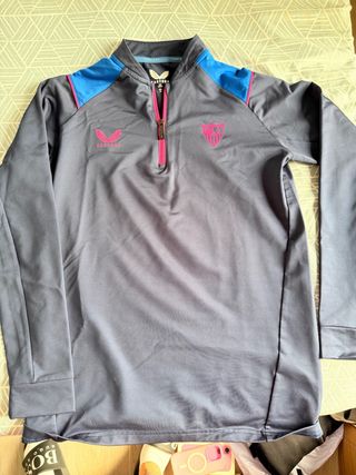 Chándal Sevilla FC Castore Azul/Rosa
talla niño!